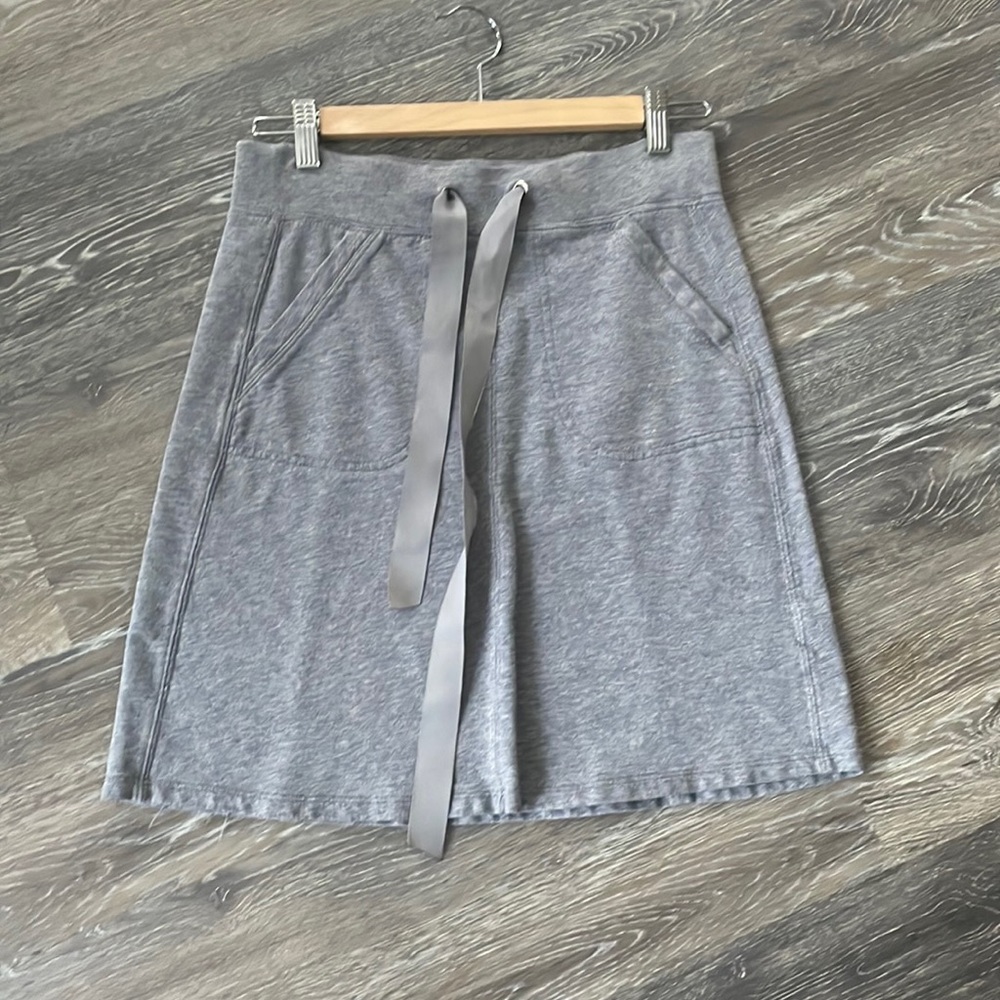 Sweatskirt from Jacob. Grey terry material skirt with drawstring.